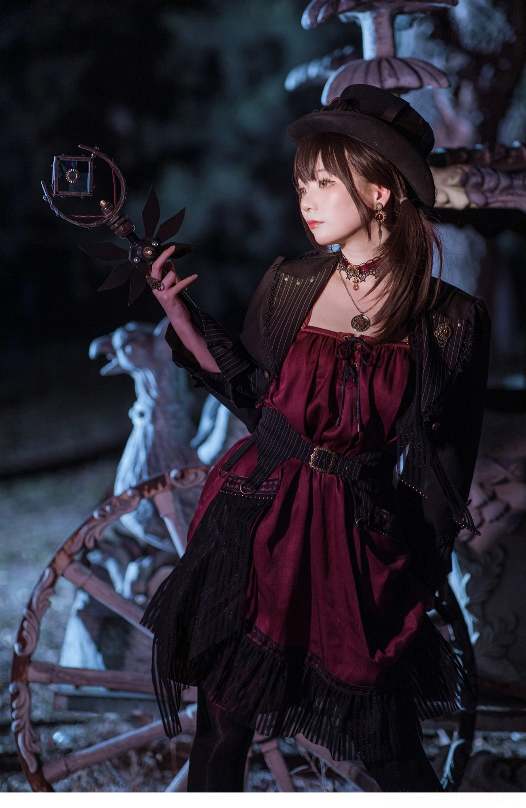 Gothic Lolita black cardigan jacket collar detail tailored neckline striped lining metal embellishments close-up view