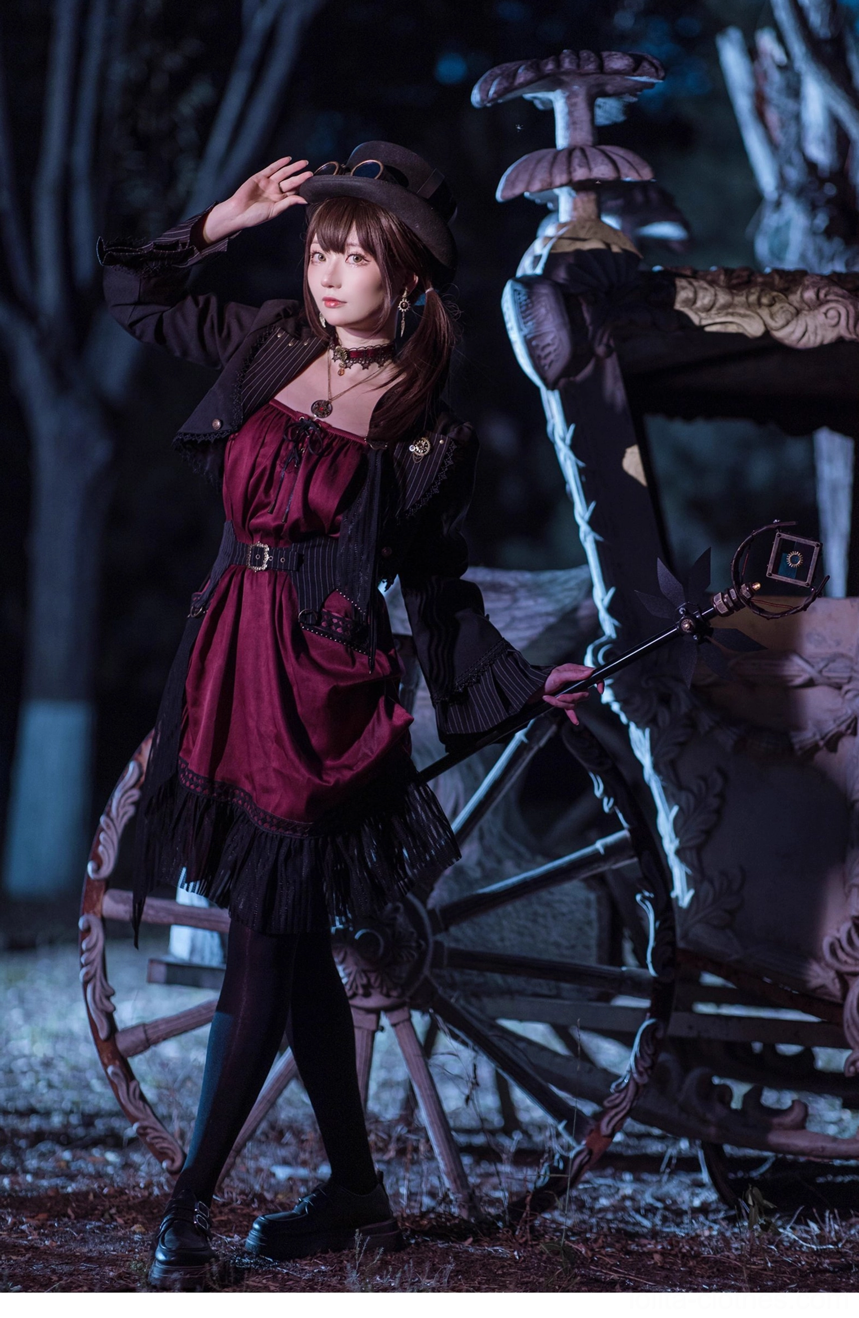 Gothic Lolita black cardigan jacket front panel detail metal studs rivets studded lapels design elements close-up view