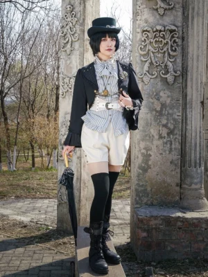 Full body front pose model wearing complete Gothic Lolita outfit with black cardigan jacket top hat and vintage park stone pillar background