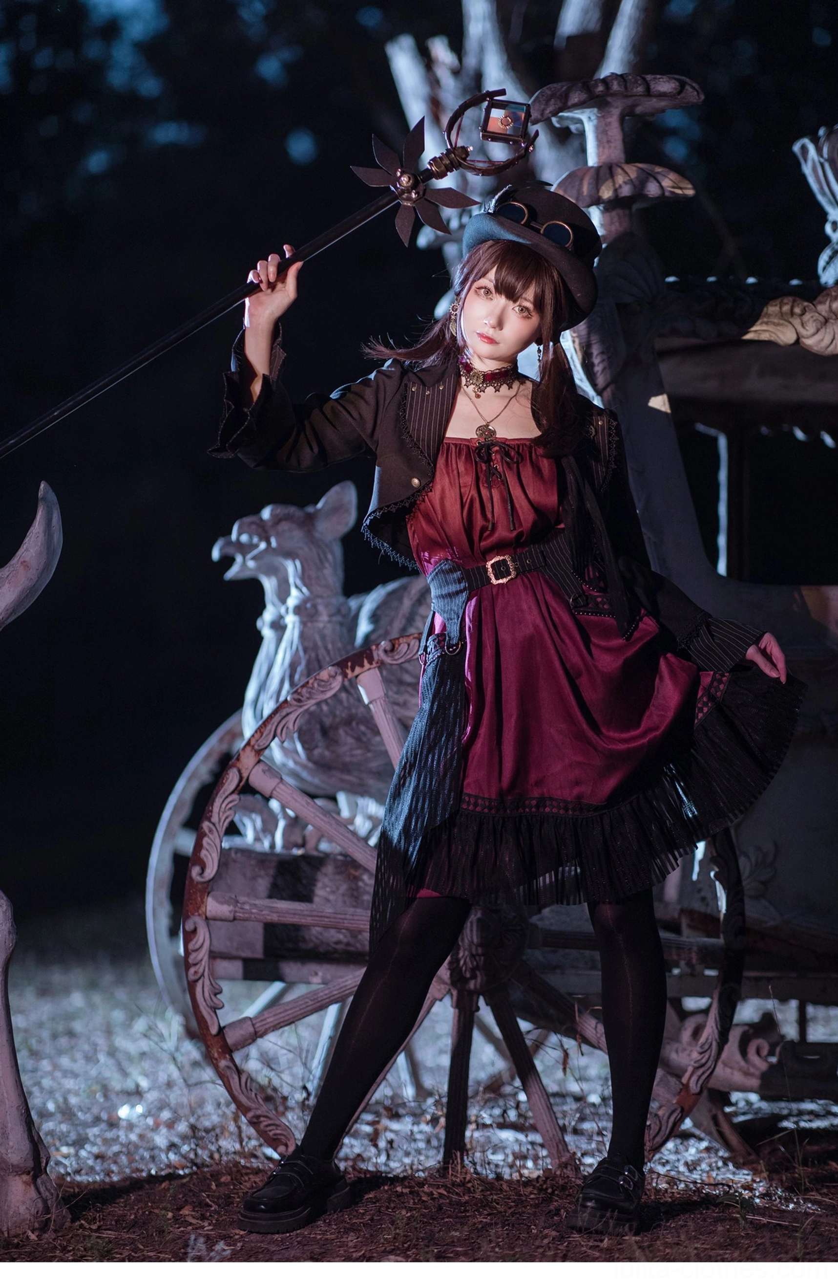 Model in Gothic Lolita cardigan jacket steampunk inspired accessory coordination pocket watch chain jewelry