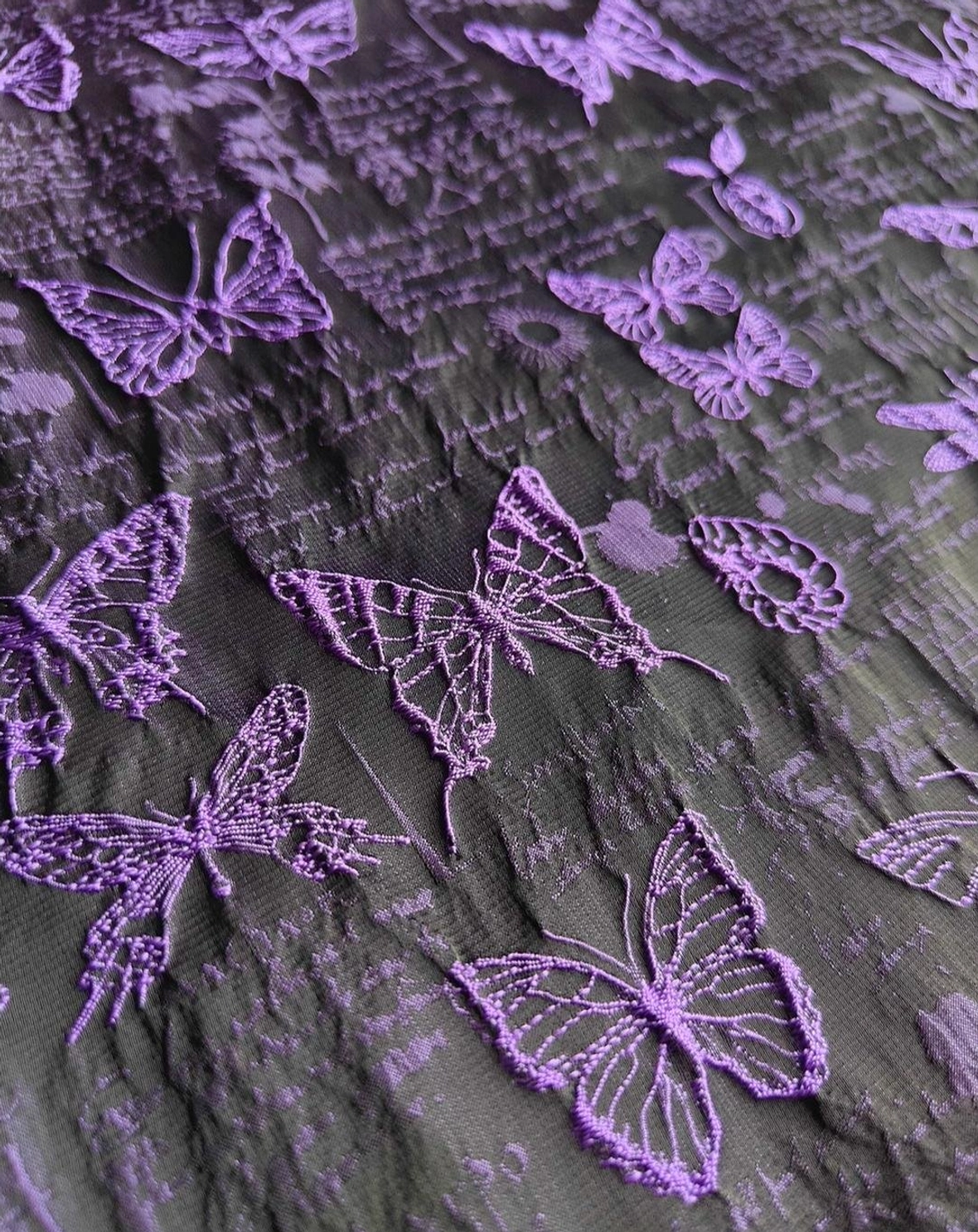 Chiffon ruffle drape of gothic lolita skirt showing flowing fabric movement, weightless silhouette, layered ruffle construction, and ethereal aesthetic in motion