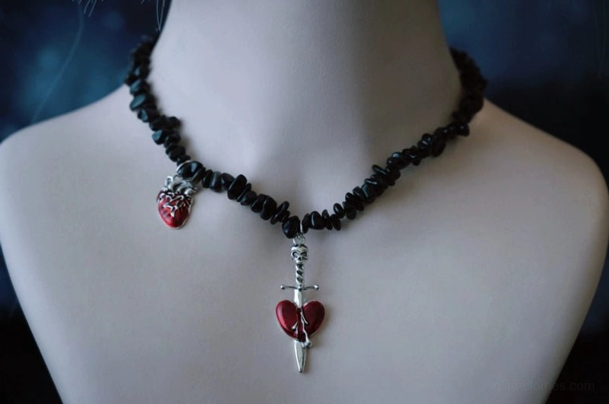 Blood-themed gothic lolita choker with obsidian chain and dual pendants featuring tiny red heart and sword-pierced blood-red heart, dark romantic decor