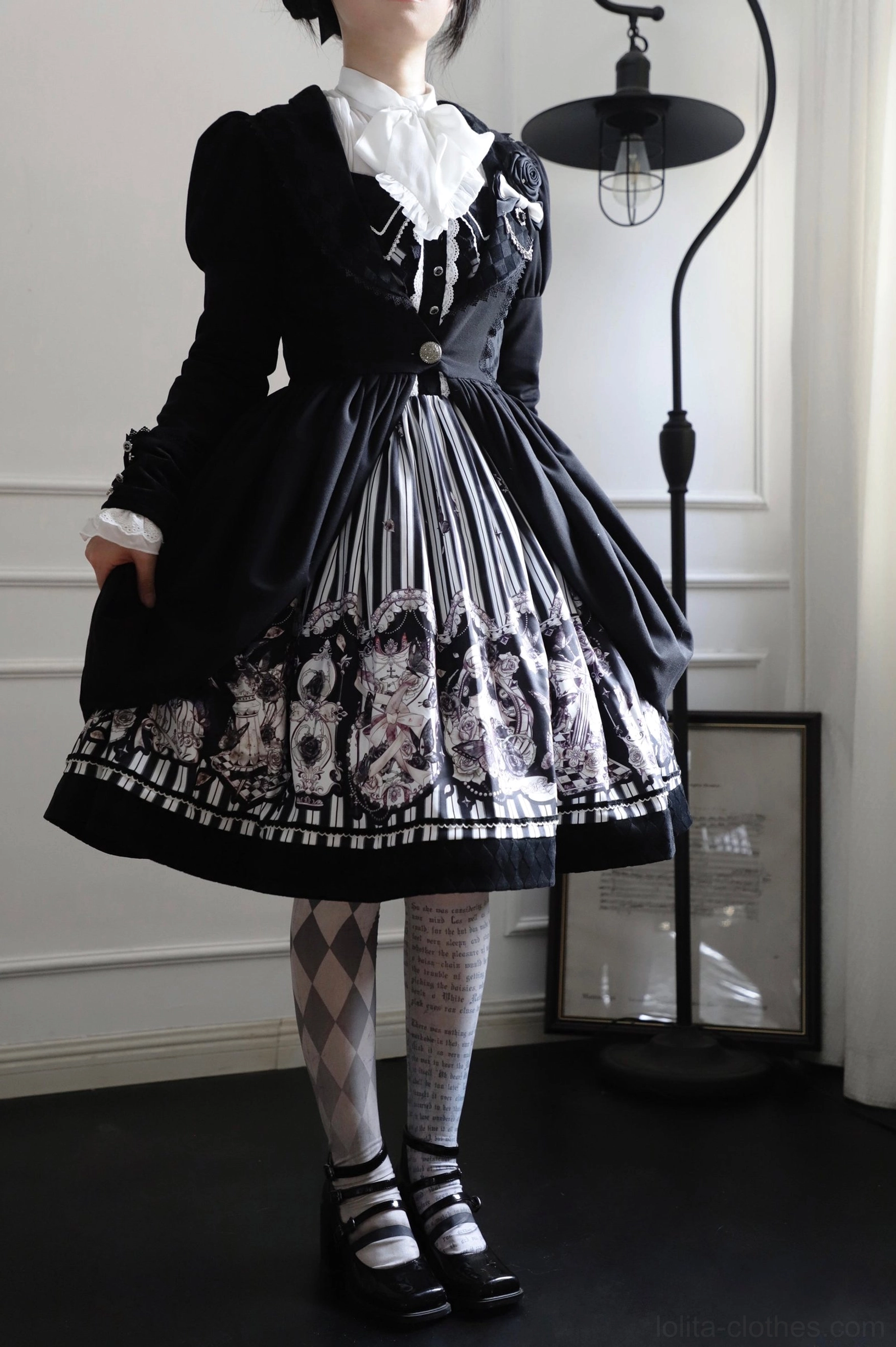Gothic Lolita coat puffed sleeve structure tailored fit ruffled cuff detail black fabric construction quality