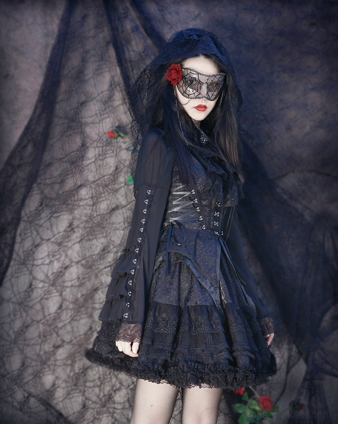 Close-up half-body view of gothic lolita corset vest showing fishbone boning structure, side lacing details, butterfly-shaped hemline with butterfly print pattern, and refined lace trim