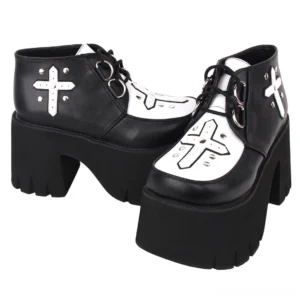 Pair of gothic lolita cross platform ankle boots front direct view matte faux leather dual-tone design with metal cross decoration thick block platform heels
