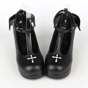 Pair of Gothic Lolita T-strap high heel shoes with white cross embroidery on round toe, front frontal view, black PU leather construction with block platform heel