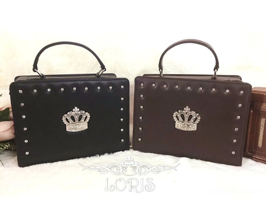 two-tone studded gothic lolita crown handbags flat lay display black and dark brown options metal round studs metallic crown ornament leather top handle white backdrop