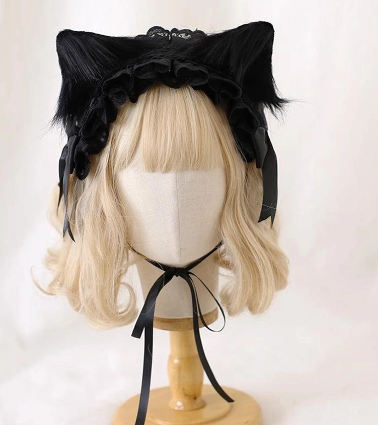Gothic Lolita lace headdress featuring removable black cat ears and matching black satin bows and neck strap, displayed on mannequin front angle