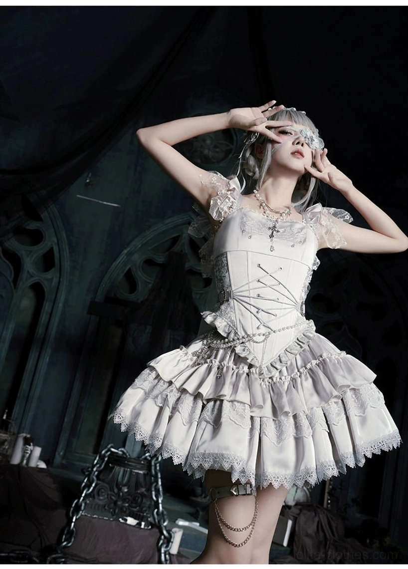 Gothic lolita detail shot showing swan candlestick motif embroidery cross design ecclesiastical symbolism