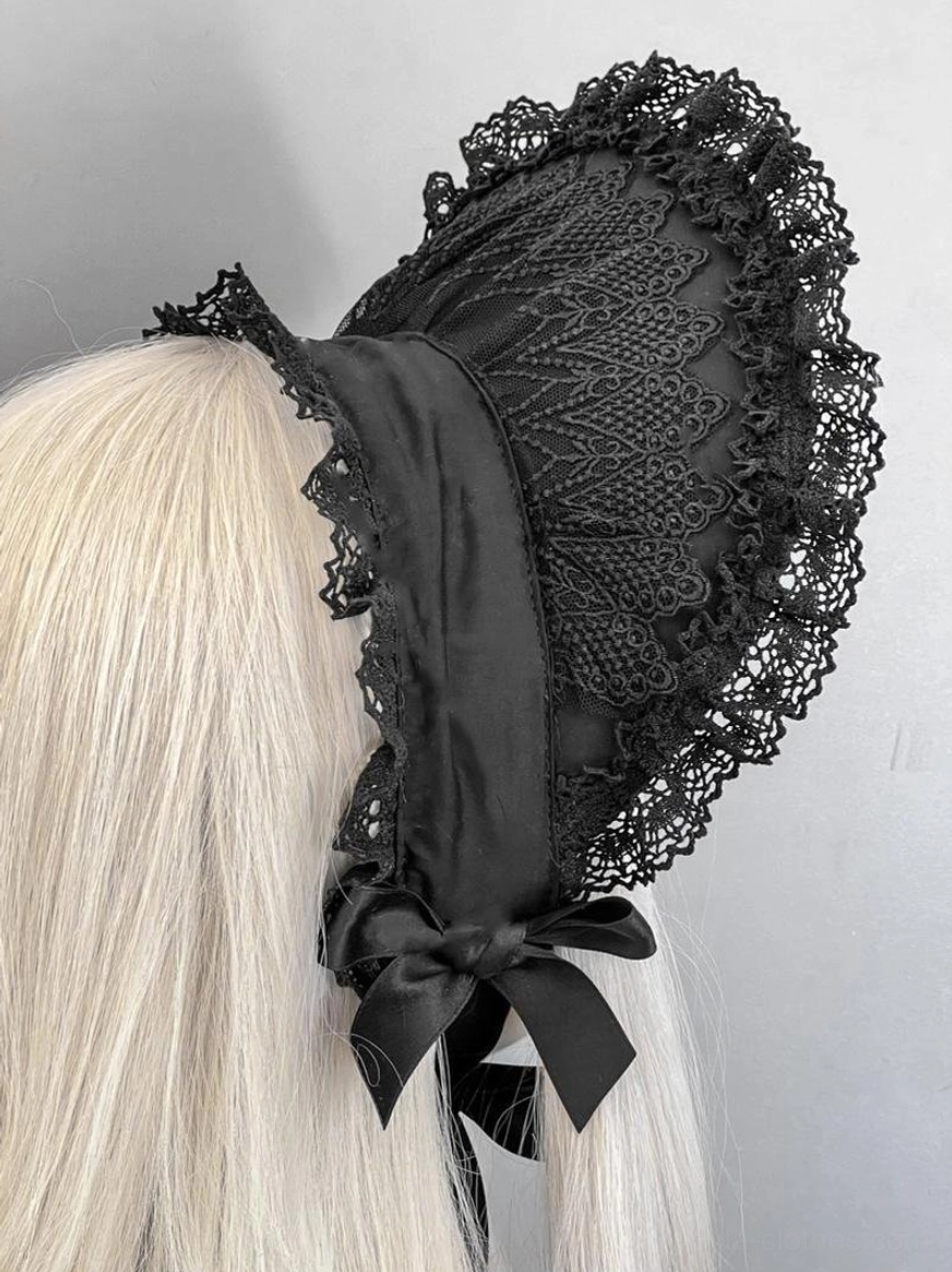 Gothic lolita embroidered lace bonnet rear right side view with embroidered lace fabric panel, scalloped lace trim, satin bow back neck