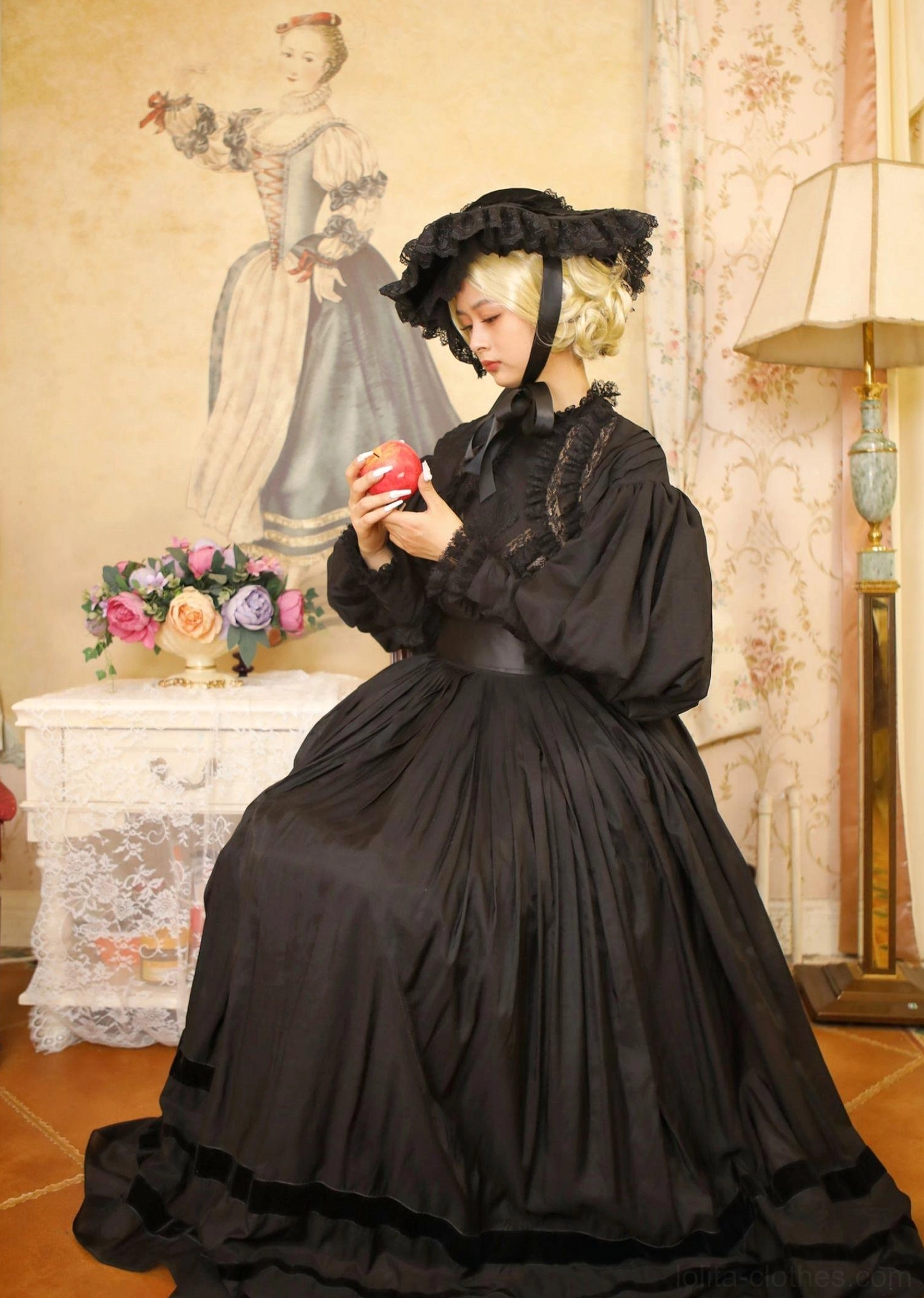 Gothic Lolita ensemble showing coordinated black bonnet, dress, and accessories creating cohesive formal Gothic Victorian aesthetic suitable for evening occasions and special events