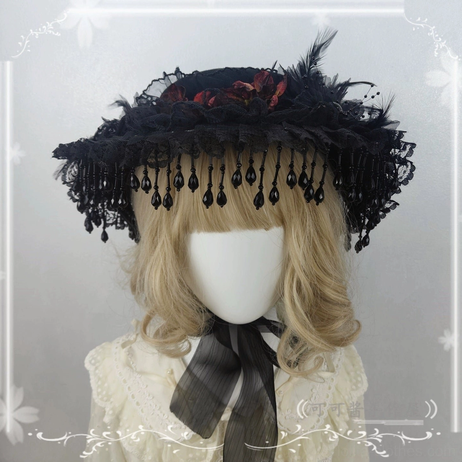 Gothic Lolita flat-top hat angled frontal view black lace-fringed brim red flowers black feathers beads ribbon