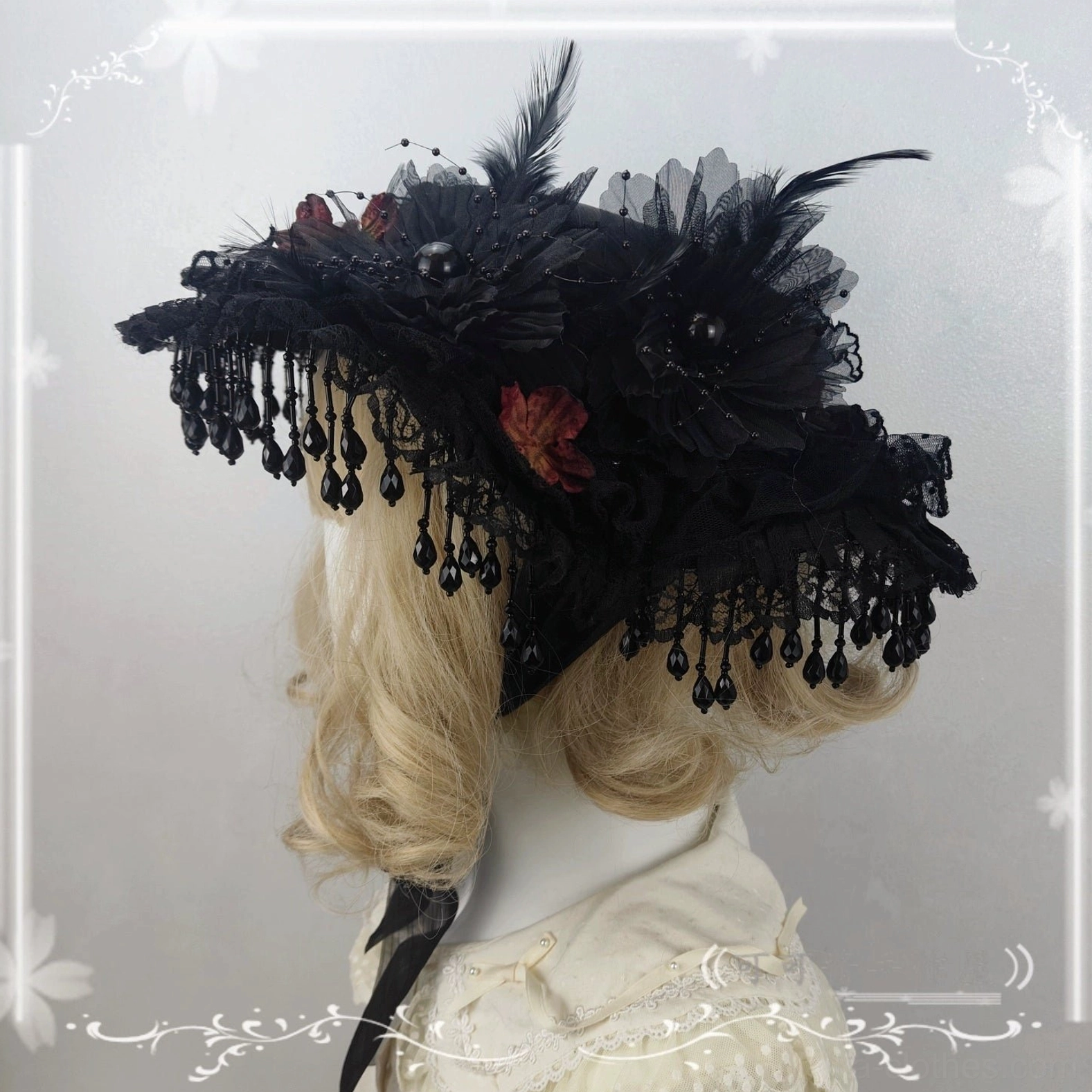 Gothic Lolita flat-top hat back left angled view black brim large mesh flowers black feather trims beads ribbon