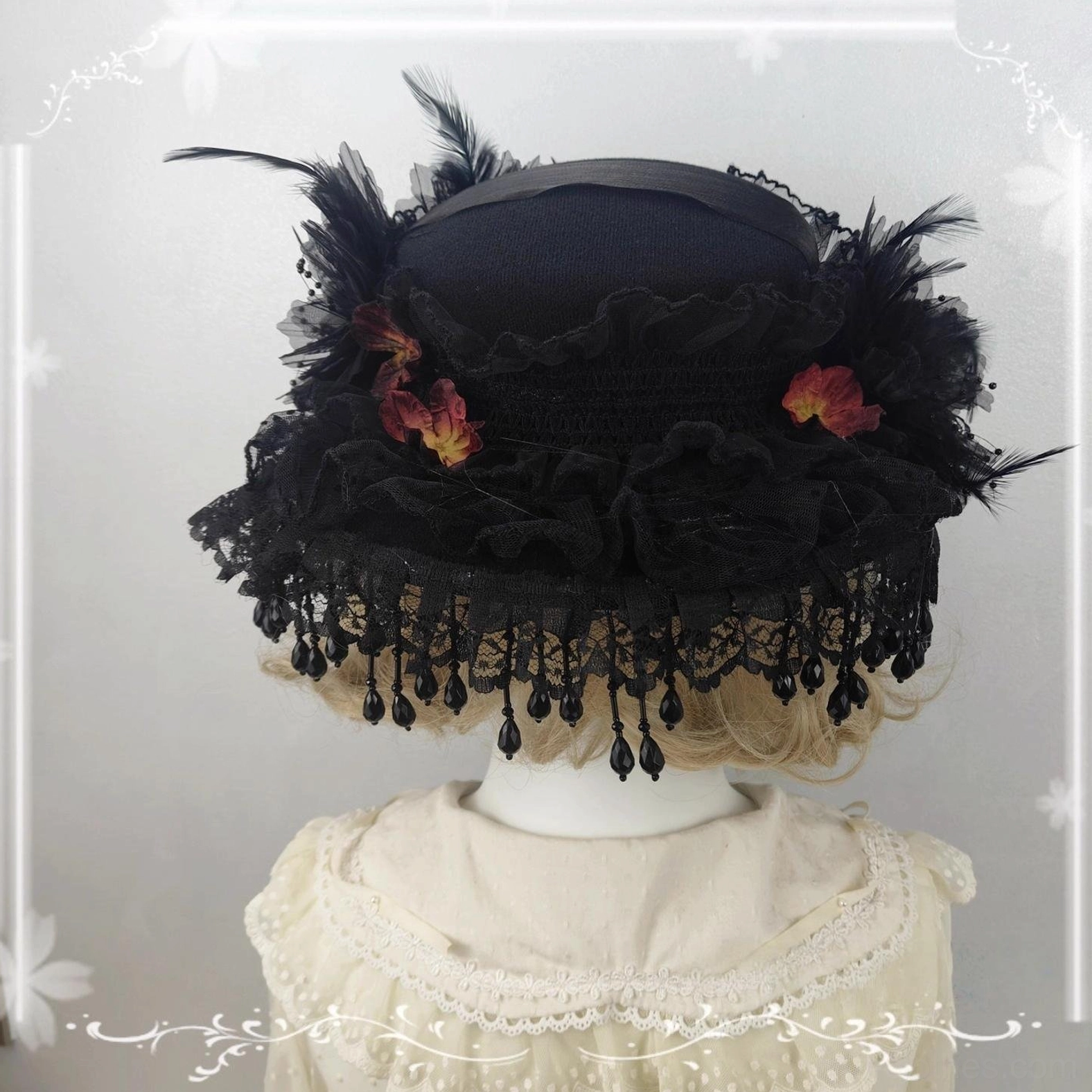Gothic Lolita flat-top hat back view decorated red dried flowers black feathers lace ruffles bead tassels