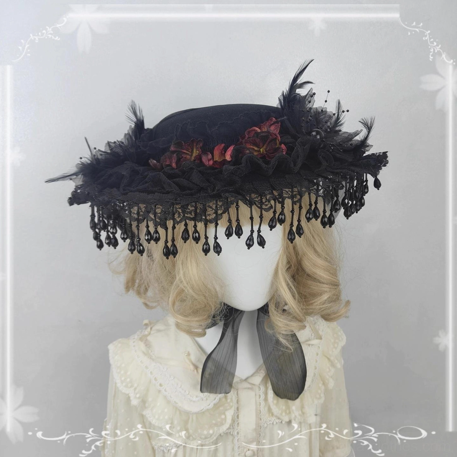 Gothic Lolita flat-top hat frontal view black feathers red flowers lace ribbon ties mannequin blonde wig