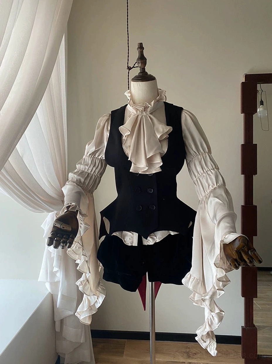 Gentleman-style Gothic Lolita outfit featuring beige ruffled neck cravat, white ruffled long-sleeve blouse, black waistcoat with bat tail hem and bloomer shorts