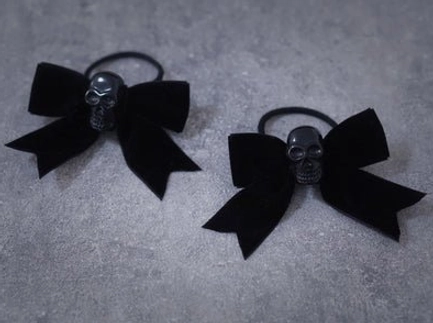 Premium gothic lolita hair clips with intricate charm details and quality metal hardware construction close-up view