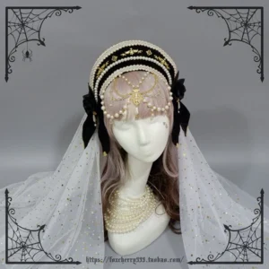Gothic style black and gold lolita headdress with pearl trim edges, black side bows, forehead pearl tassel decoration, and dotted sheer white veil on mannequin