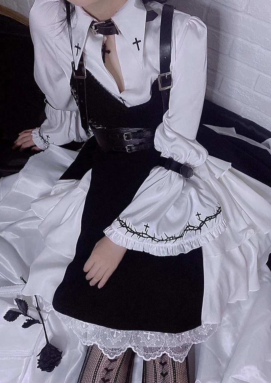 gothic lolita cross embroidery shirt lace-trimmed skirt with vertical heart mesh fishnet tights close-up