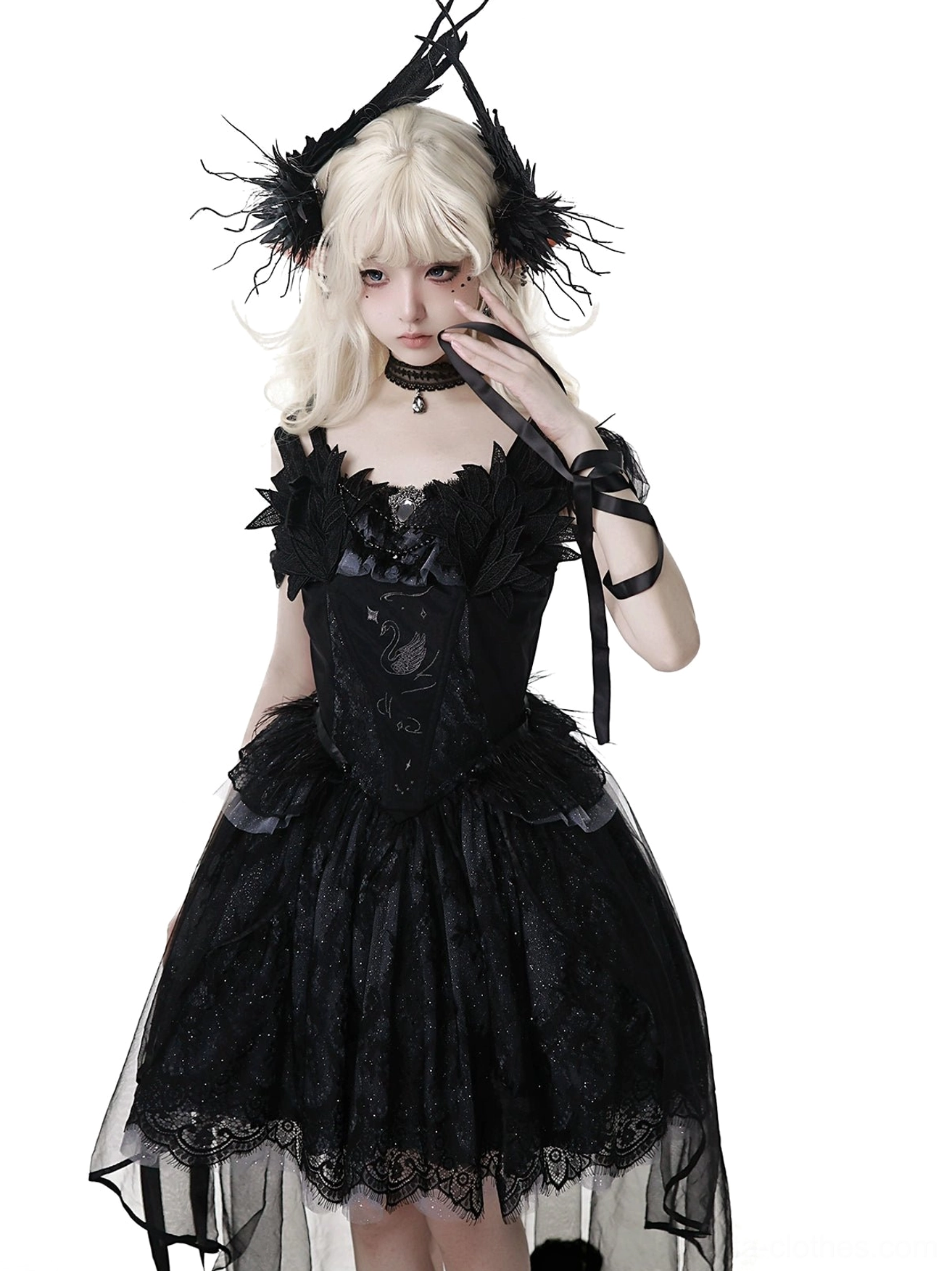 Black gothic lolita JSK dress arm ribbon accessory detail showing wrist strap design that complements the complete coordinate set