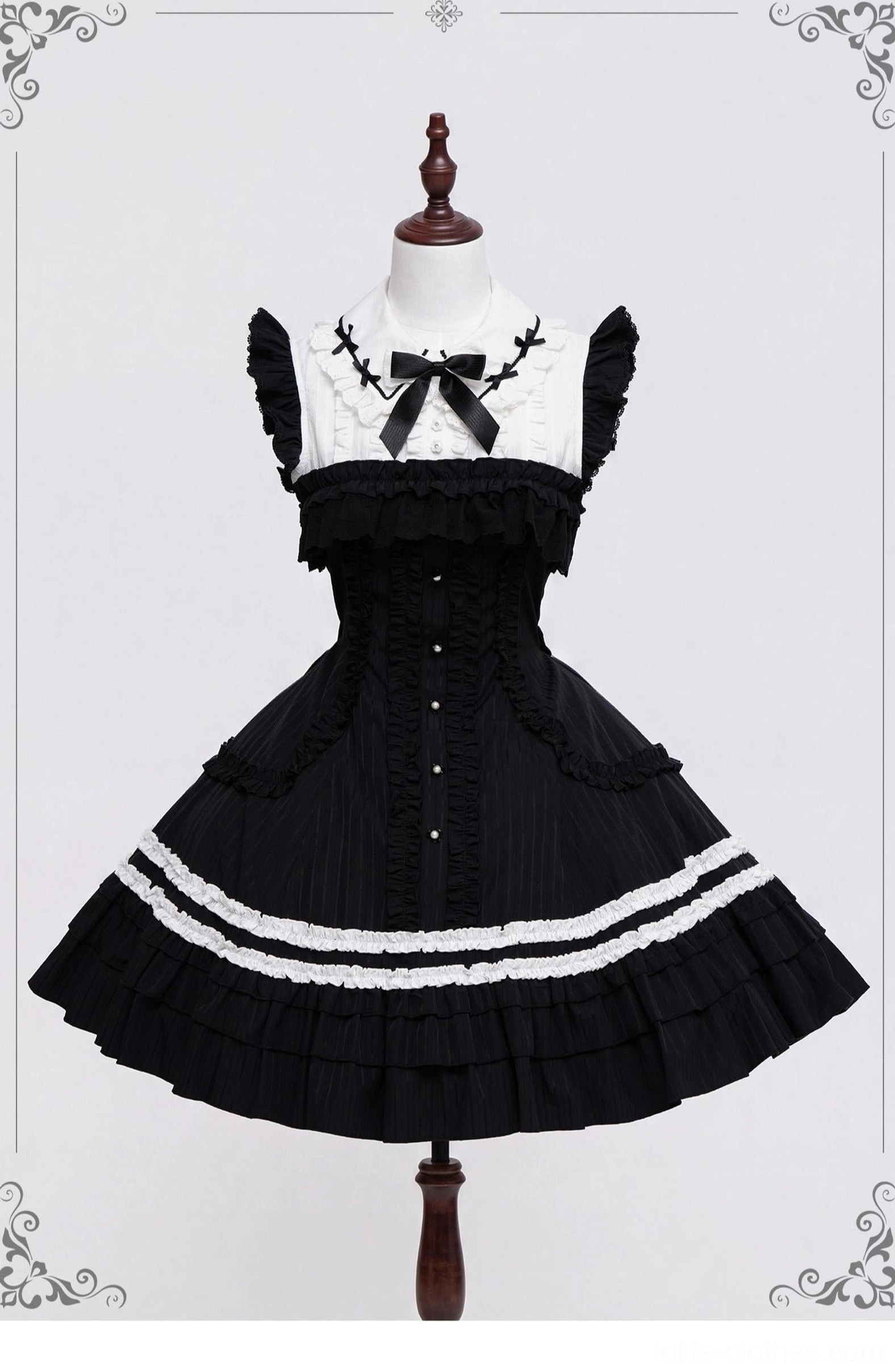 Gothic lolita black white contrast JSK jumper skirt front view with doll collar satin bow ruffled lace hem on mannequin