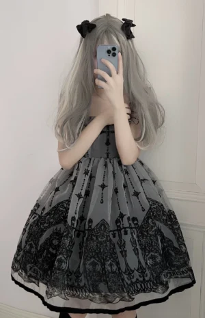 Gothic lolita jumper skirt dress full front view worn by model showing fitted square neckline and complete gothic printed tulle skirt with cross embroidery patterns