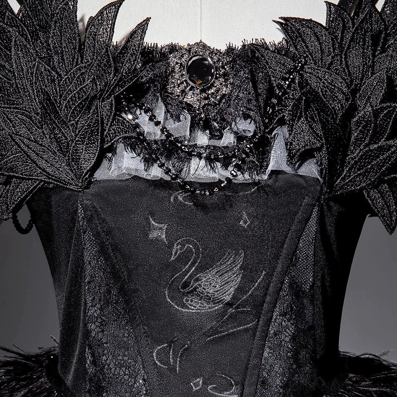 Black gothic lolita JSK dress flat lay display showing full dress piece with accessories laid out for detailed product showcase and dimension reference