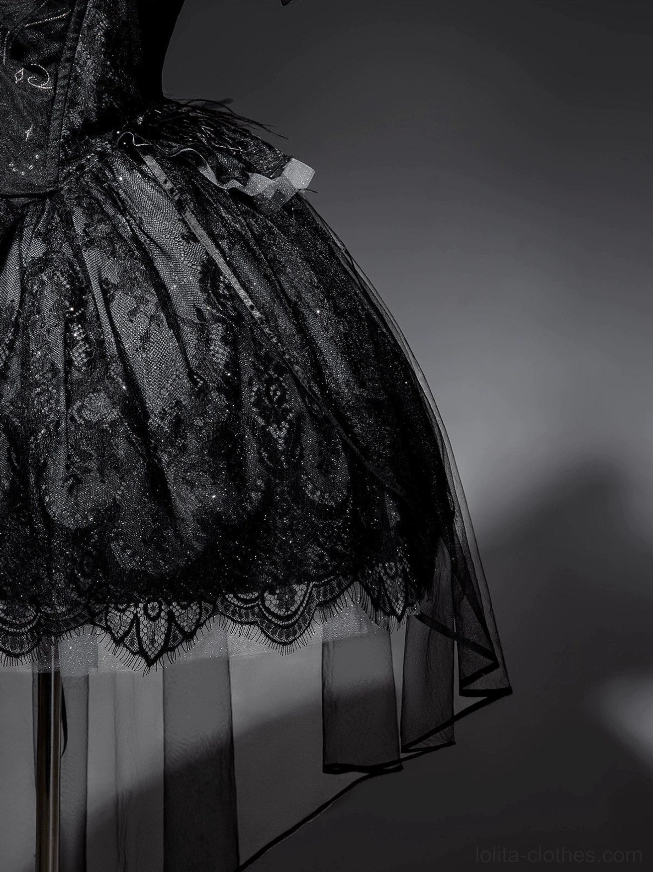 Black gothic lolita JSK dress packaging or presentation showing product boxed or prepared for shipment with care instructions included