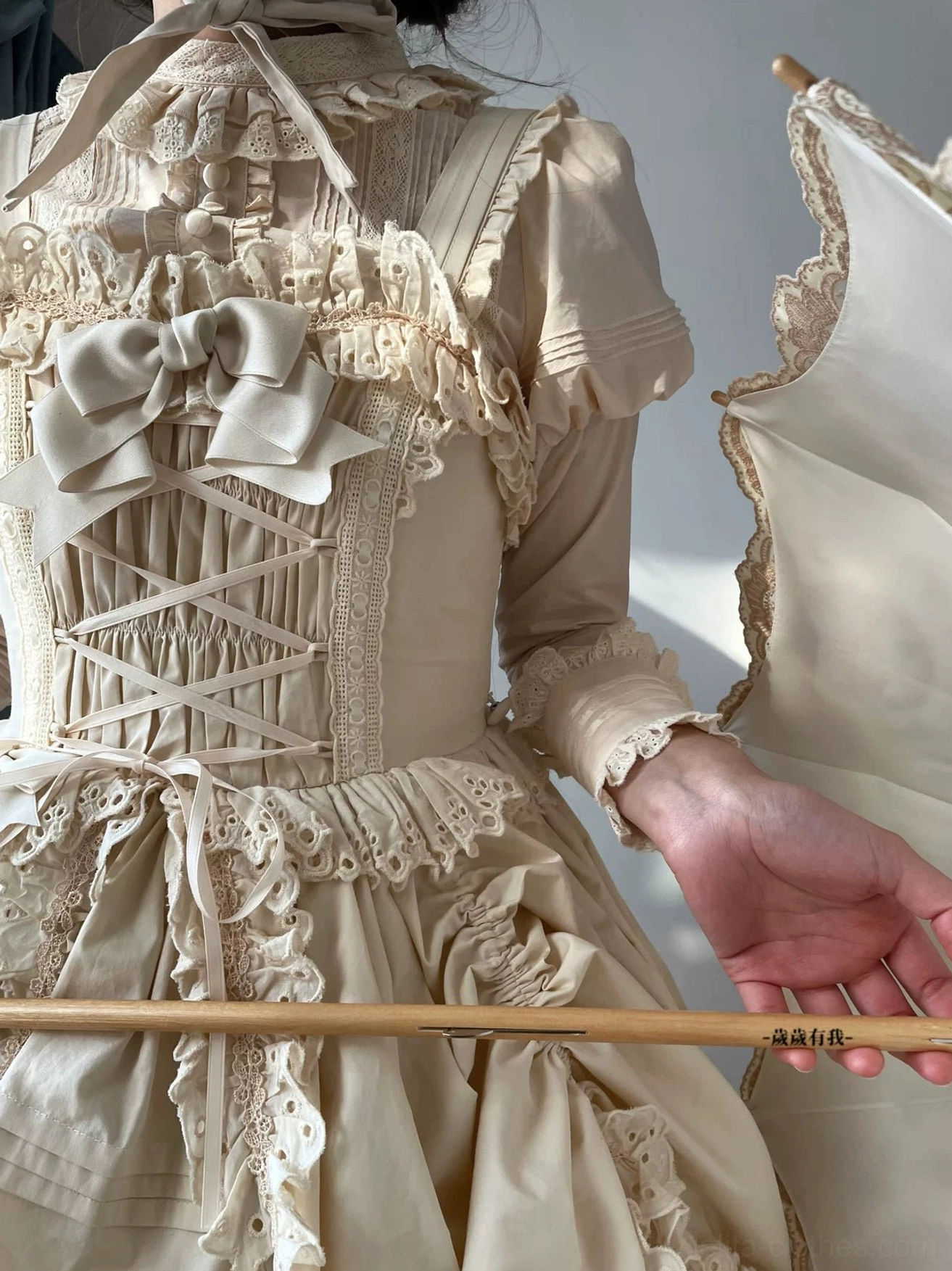 Seasonal styling guide for Gothic Lolita JSK showing coordinations for different seasons and weather conditions