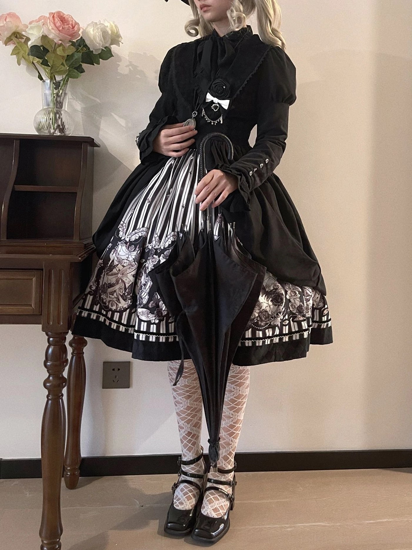 Gothic Lolita black and white striped JSK jumper skirt dress bodice close-up pattern detail decorative buttons white ruffles