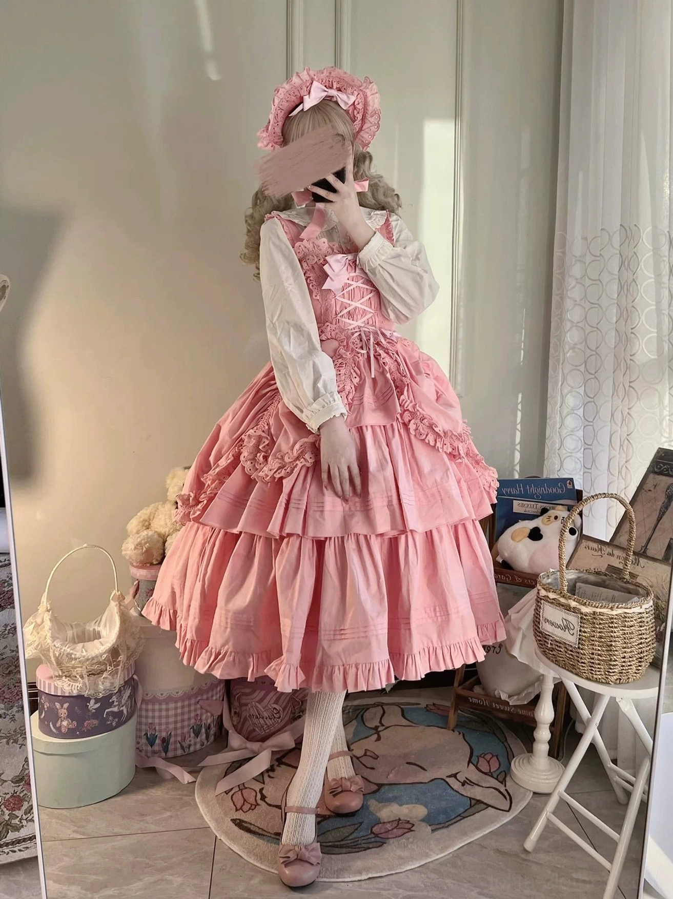 Detailed view of Gothic Lolita JSK waist bow and heart-shaped lace bag accessories showing pin-secured attachment points