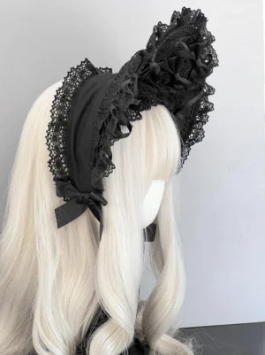 Gothic lolita wide brim lace bonnet left rear side view showing scalloped lace trim, satin bow at back neck, structured ruffled bonnet top
