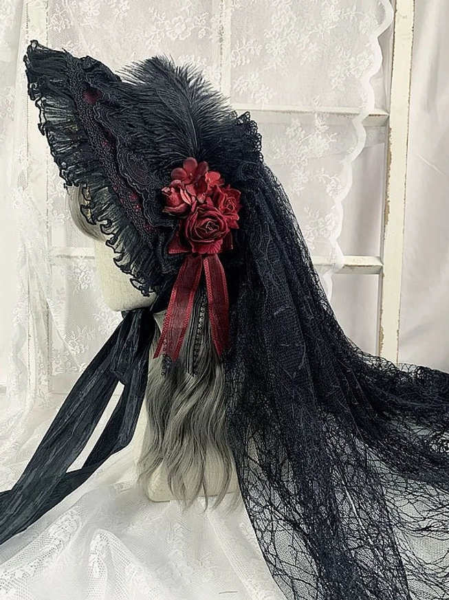 Gothic lolita lace bonnet side profile view long black sheer veil burgundy ribbon accent flower cluster