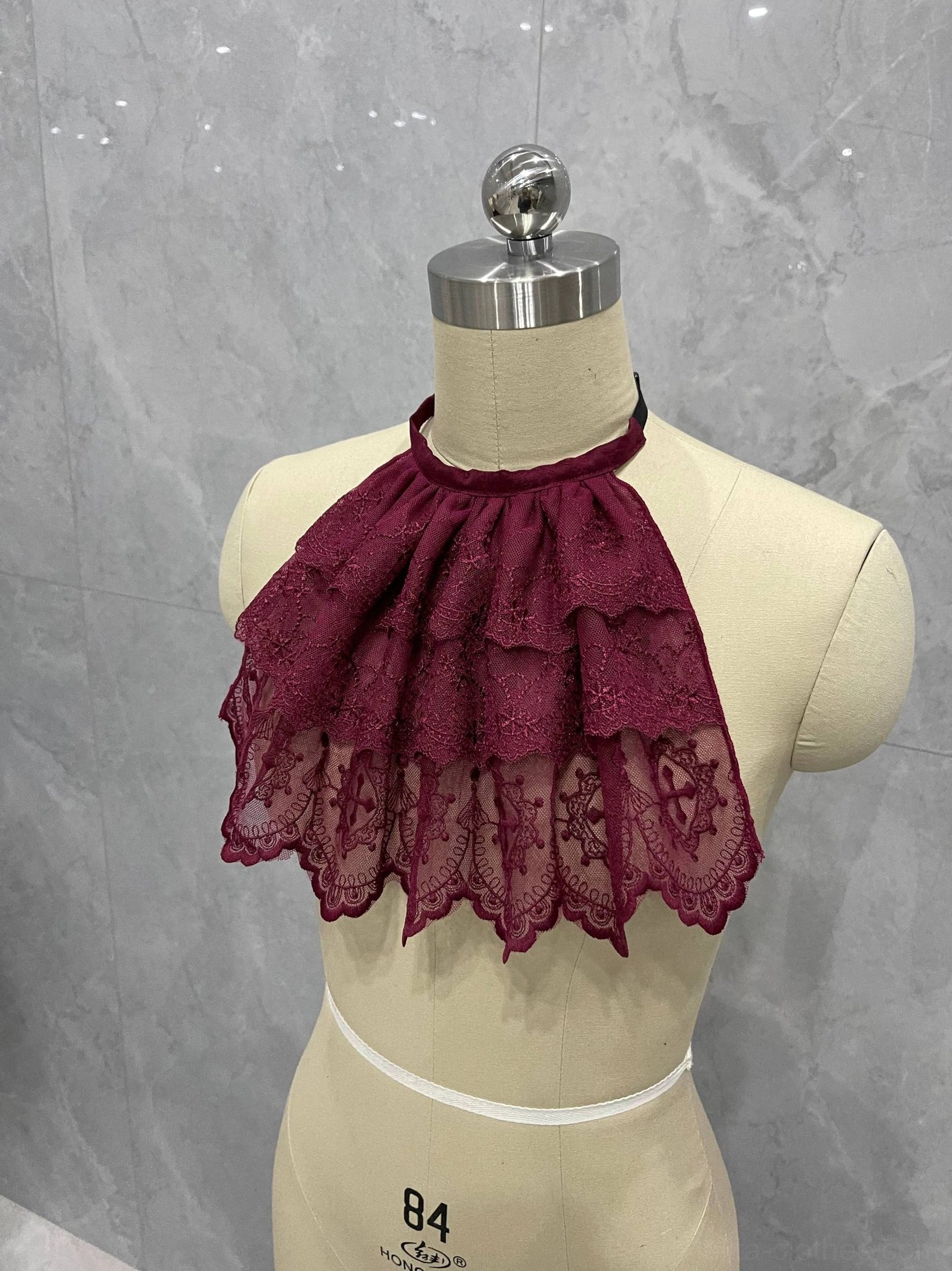 Gothic Lolita layered lace neck bib accessory product view with adjustable halter strap and cascading ruffles