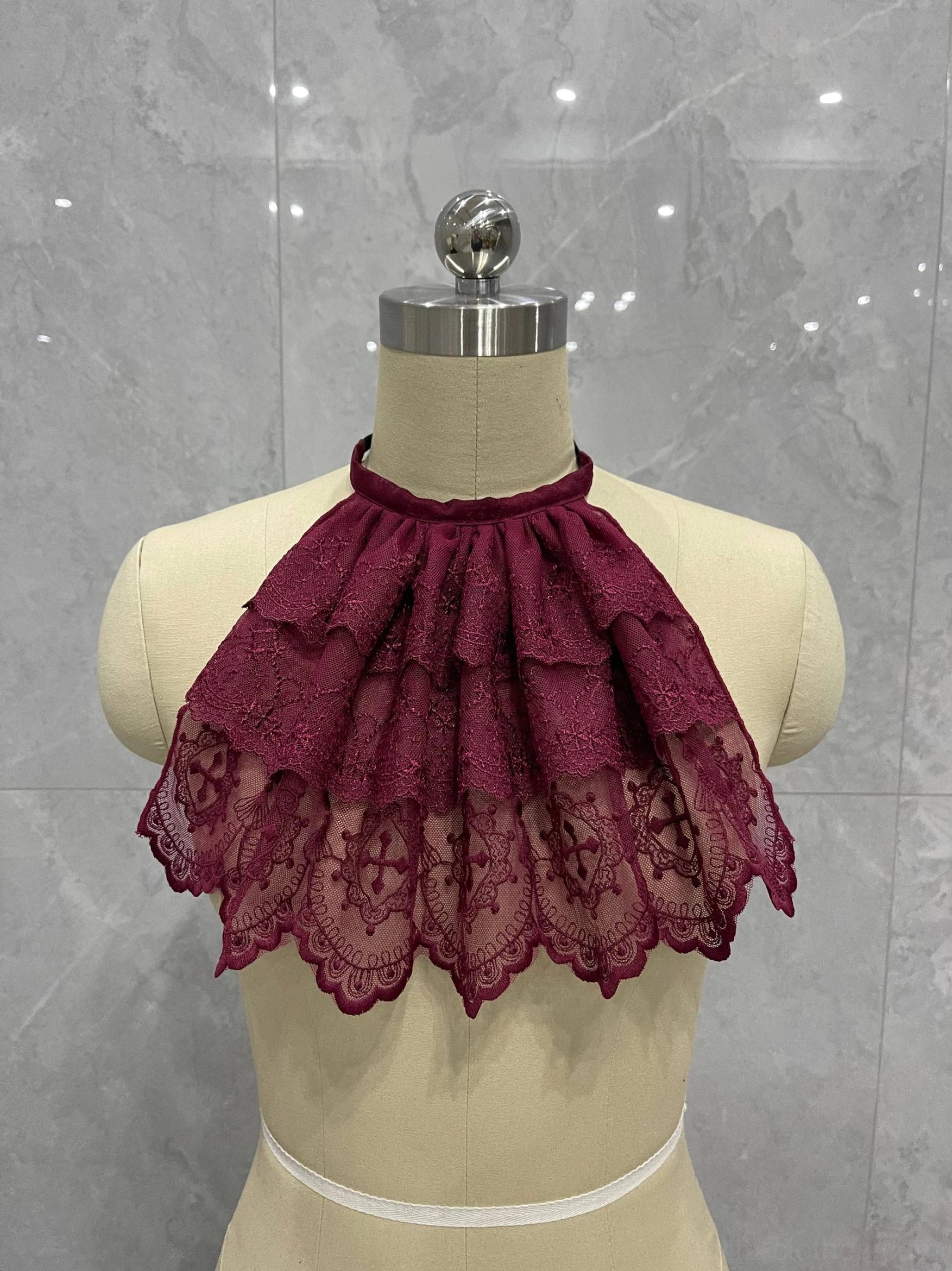 Burgundy Gothic Lolita layered lace neck bib with halter strap, ruffled lace tiers, cross trim, and scalloped hem