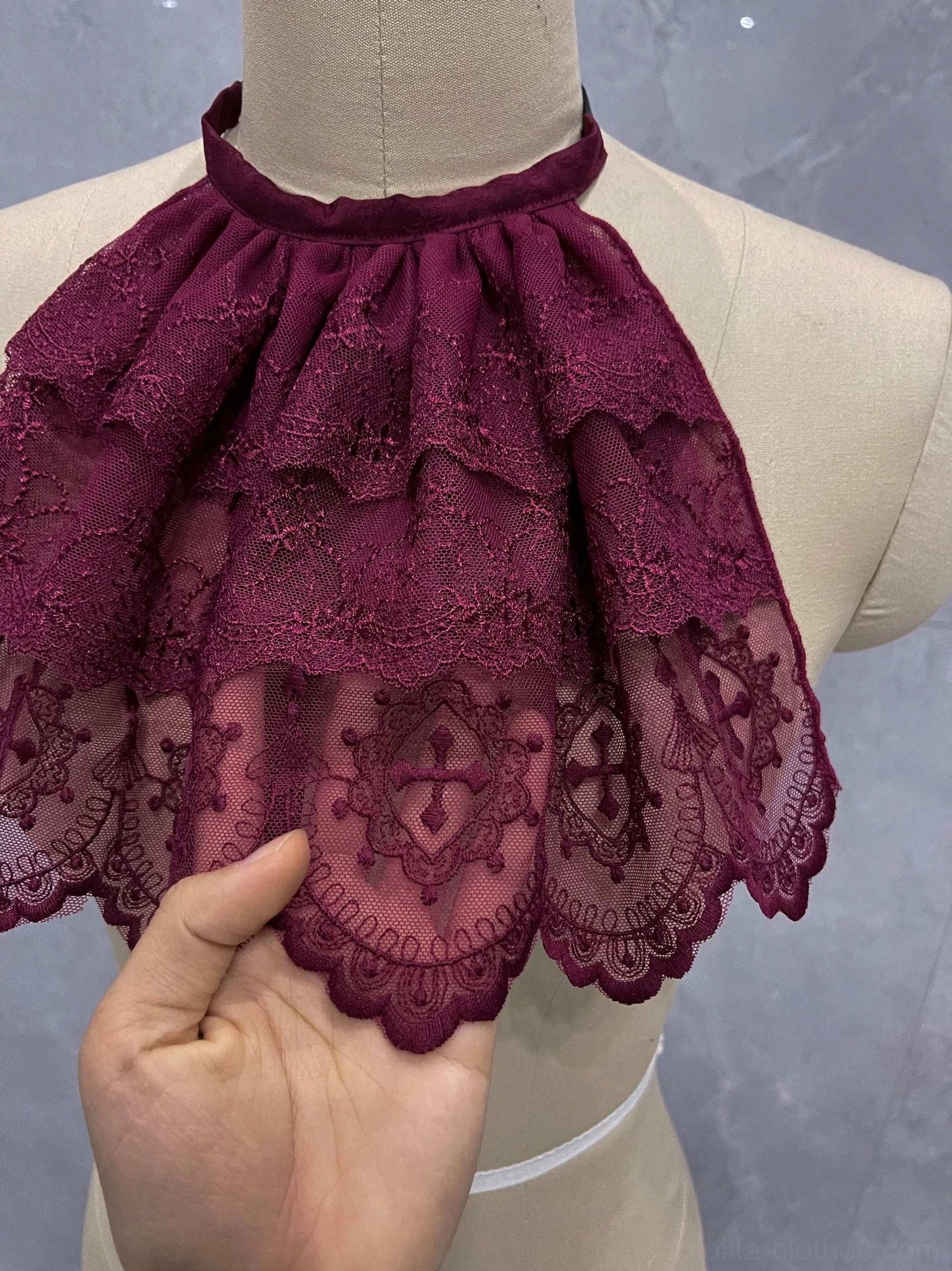 Detailed view of Gothic Lolita layered lace neck bib showing delicate lace texture and scalloped ruffle edge