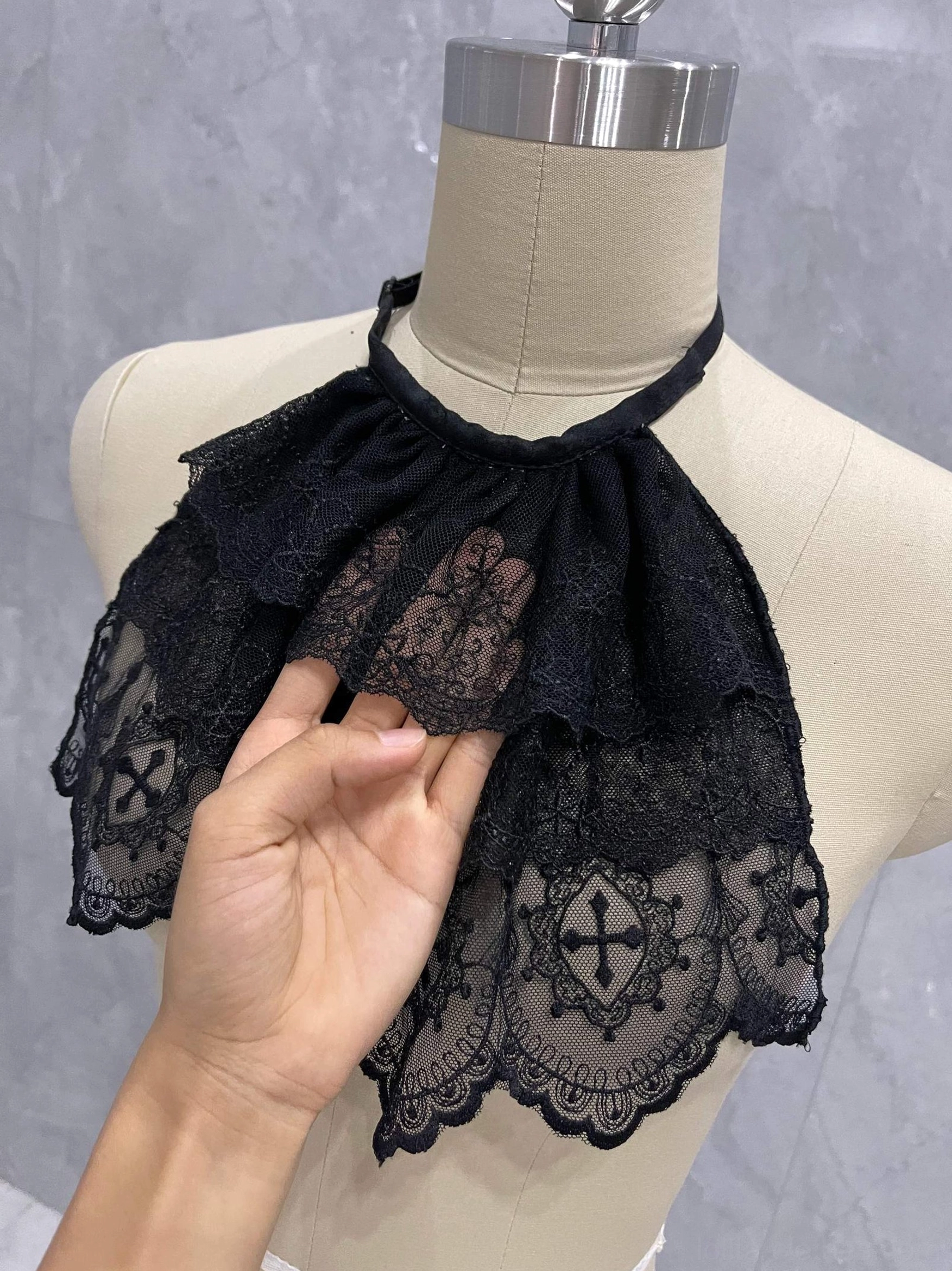 Layered lace neck bib for Gothic Lolita fashion featuring a soft scalloped hem and decorative tiered construction