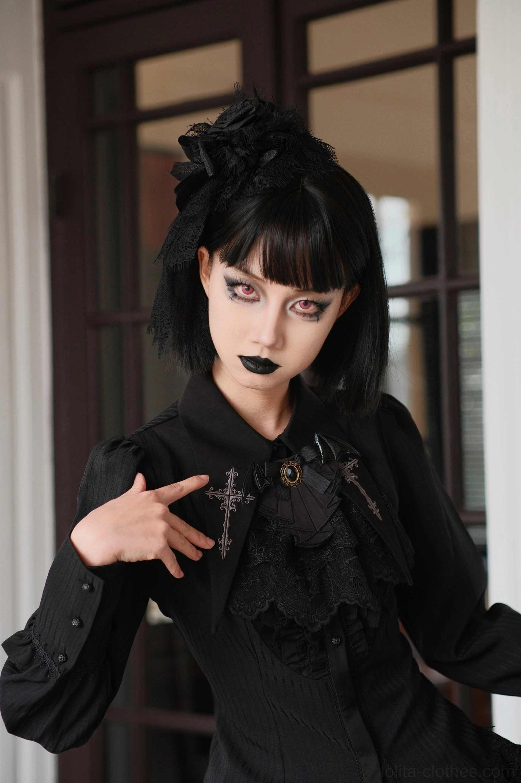 Gothic Lolita lace neck bib accessory detail highlighting layered lace trim and refined Victorian-inspired styling