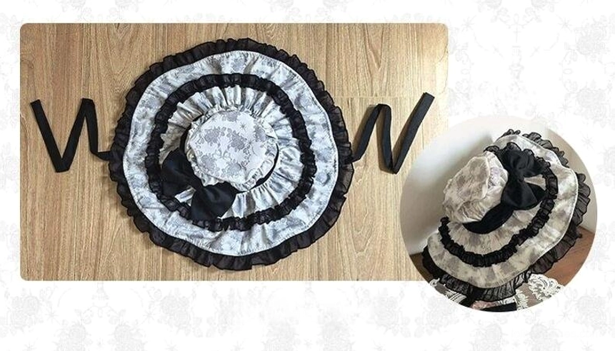 Gothic lolita matching headbow accessory flat lay ruffled black trim crow print fabric center black decorative bow accent