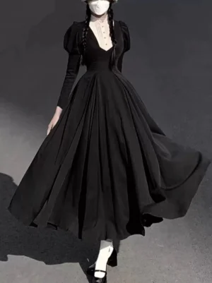 Gothic lolita nun dress side view deep V neckline pleated flowing skirt studio photography elegant silhouette