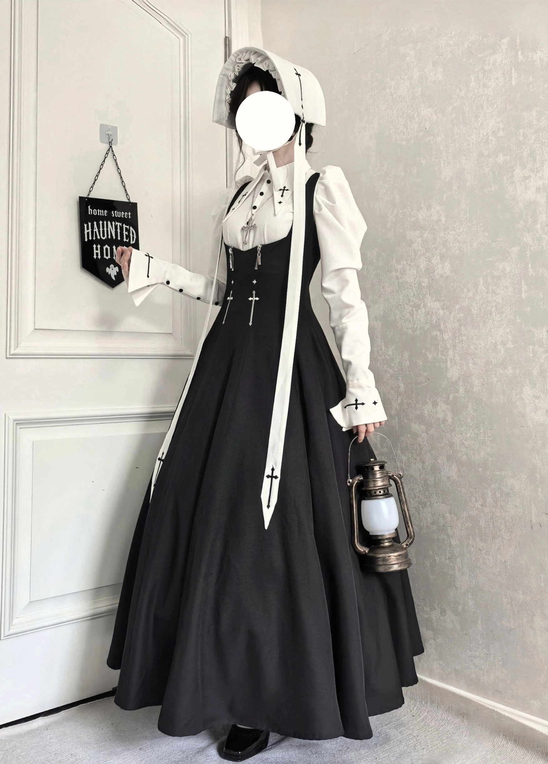 Gothic nun-style lolita full set worn with vintage kerosene lantern, black-and-white coordinate with cross embroidery details at indoor themed doorway