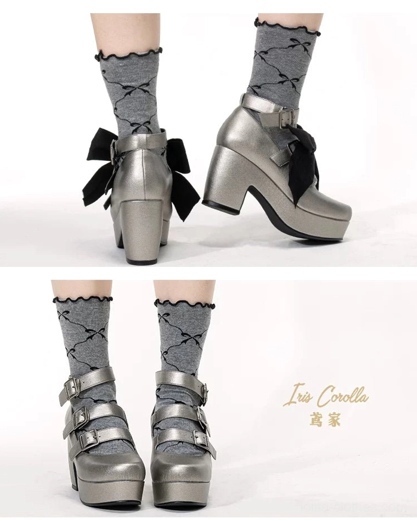 Gothic Lolita triple-buckle platform heel shoes detail shot showing genuine leather texture, natural grain patterns, craftsmanship quality, silver hardware buckle straps