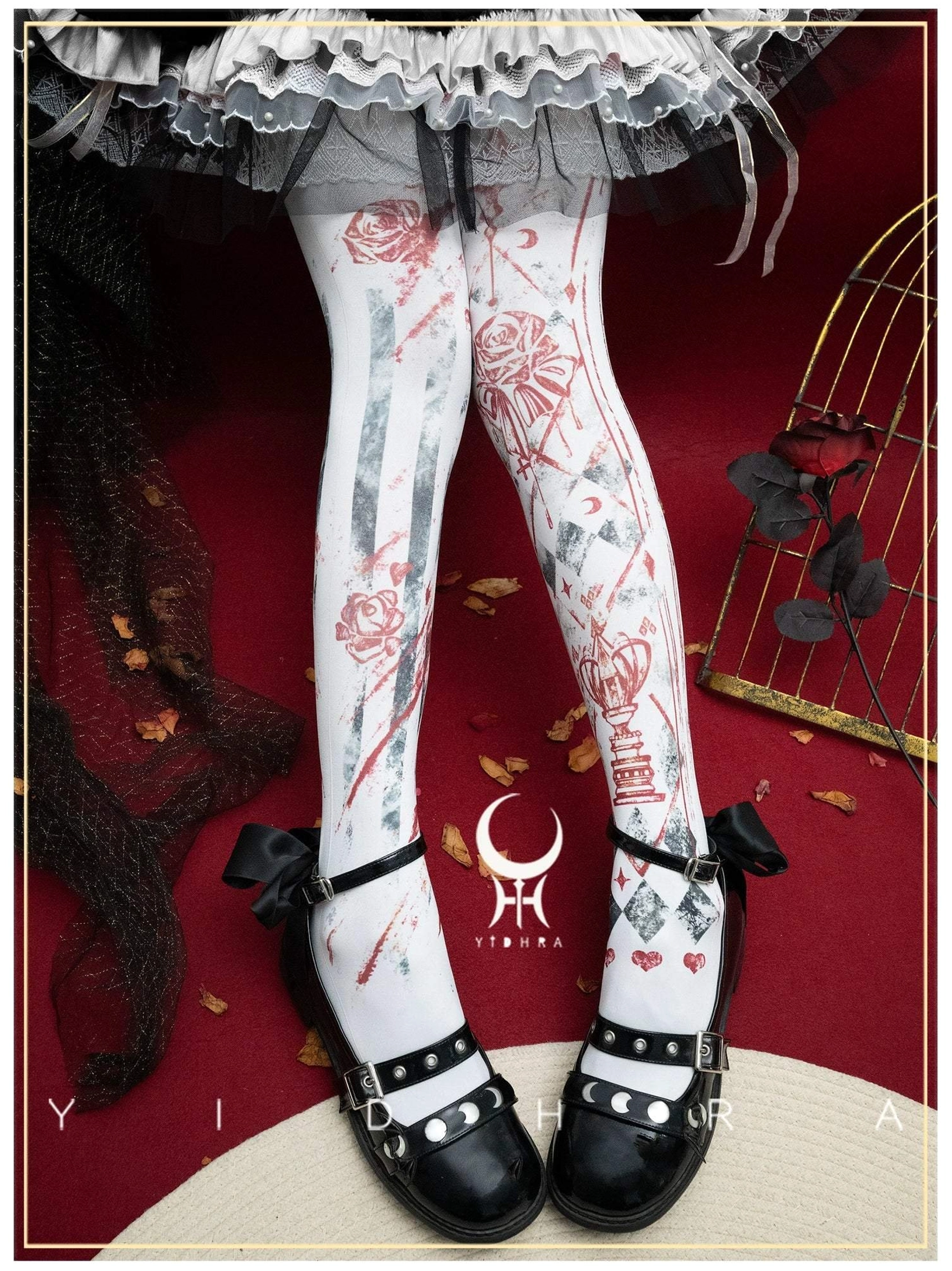 White base Gothic Lolita printed pantyhose with red rose card and heart-shaped decorative patterns styled with tiered ruffled Lolita skirt and black strap shoes