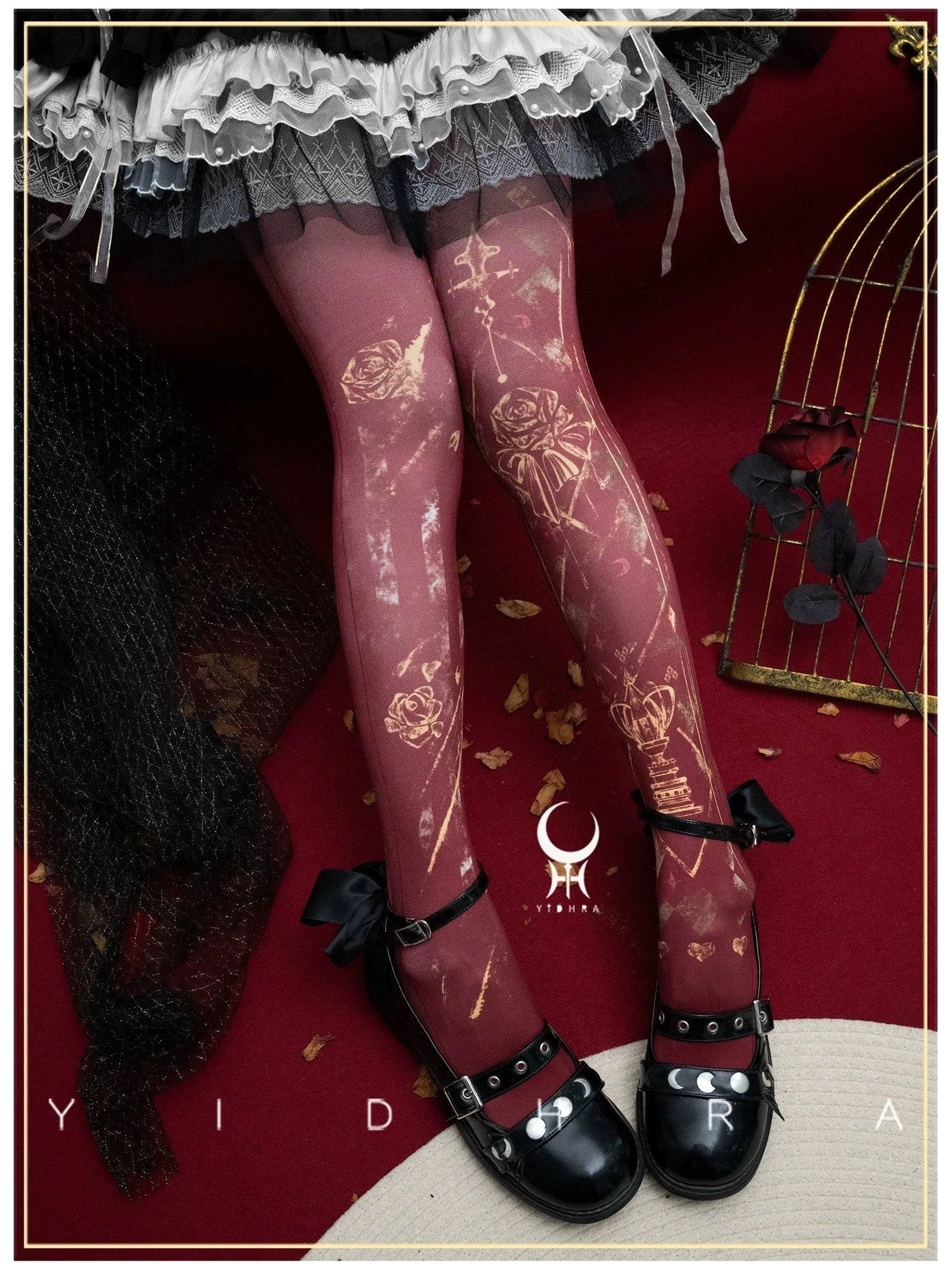 Dark burgundy Gothic Lolita printed stockings with gold rose and decorative line designs styled with tiered ruffled Lolita skirt and black strap shoes