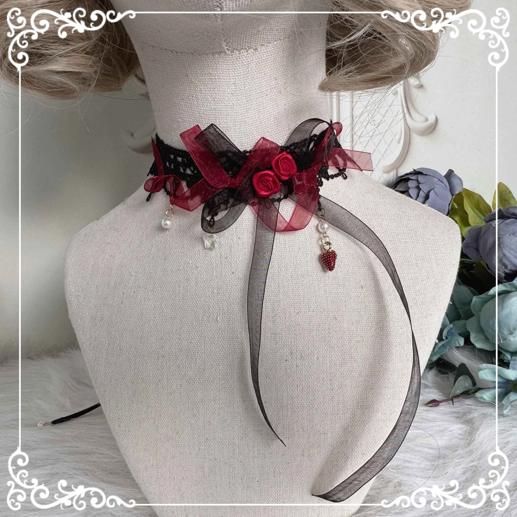 Handmade Gothic Lolita choker necklace on mannequin with central red rose detail, sheer ribbon straps, pearl dangles and heart-shaped charm pendant