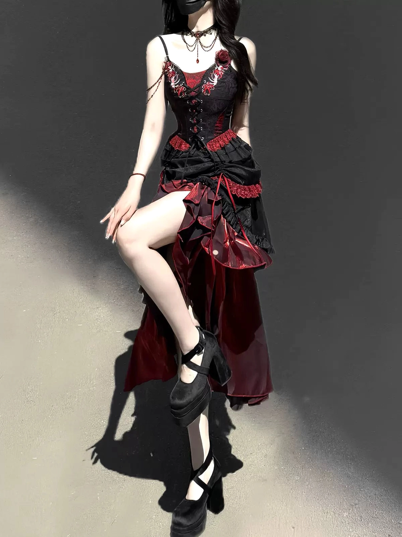 Gothic lolita layered ruffled skirt hem close-up black wine red fabric texture detail design