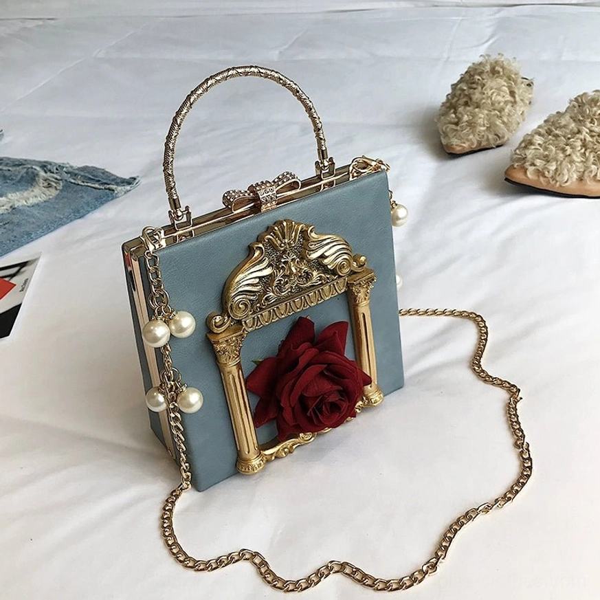 Blue gothic lolita square crossbody bag with rose pattern and pearl decorated metal chain strap baroque frame closure detail