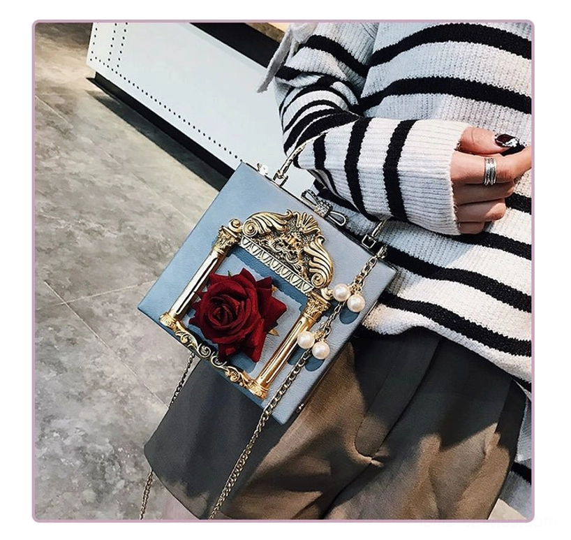 Gothic lolita baroque square crossbody bag interior detail showing hidden zipper pocket and layered zipper pouches compartment storage