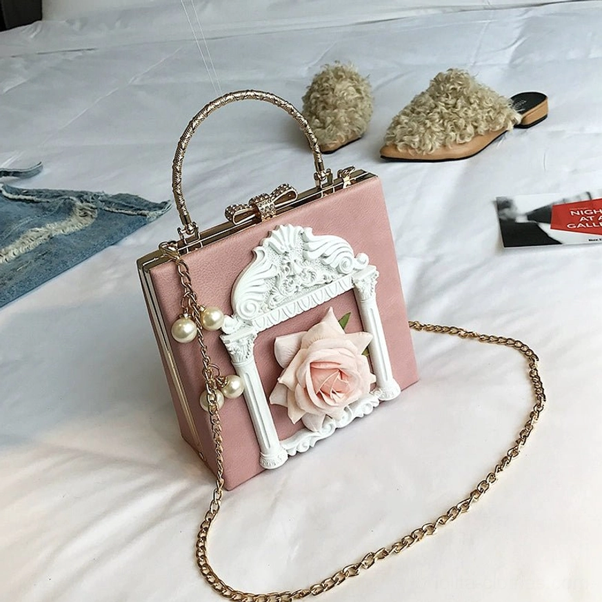 Pink gothic lolita square crossbody bag with rose pattern embellishment and ornamental chain strap detail baroque metal frame