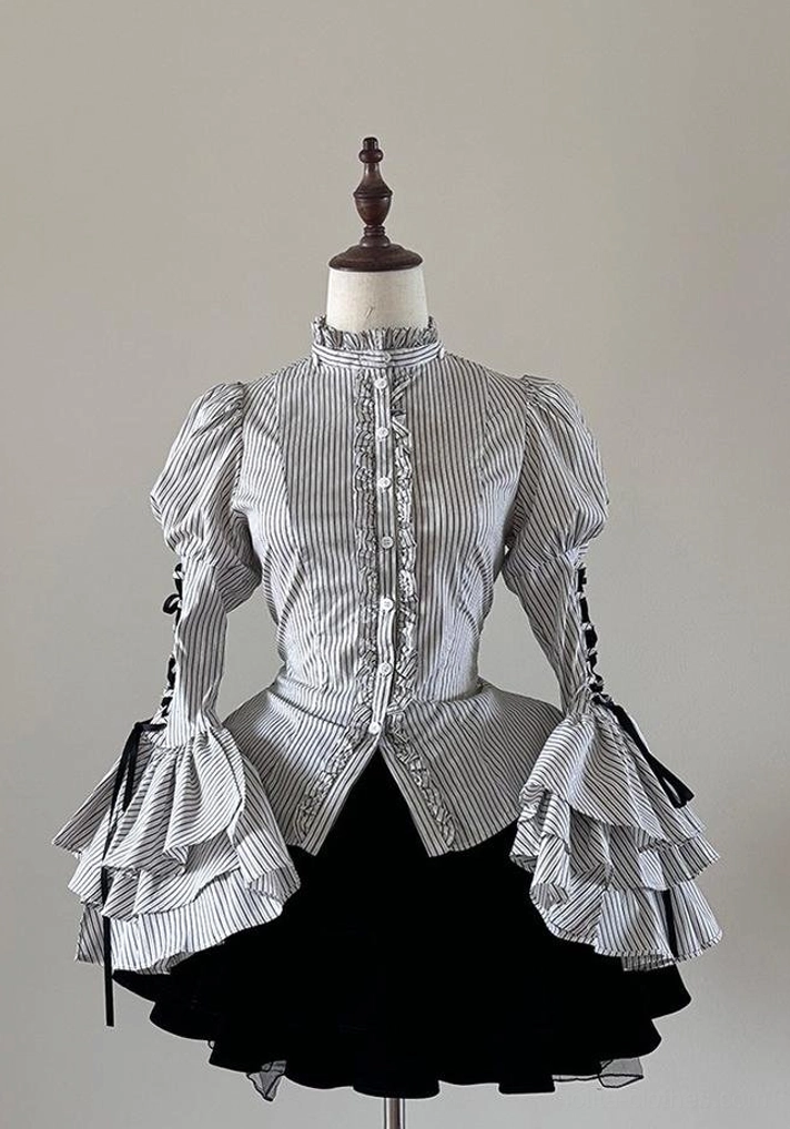 Button closure detail on front placket of Gothic Lolita striped blouse showing construction quality and button attachment system with necktie button compatibility